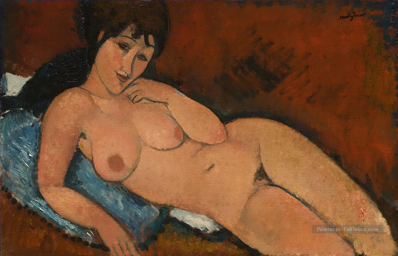nu sur un coussin bleu Amedeo Modigliani Peintures à l'huile